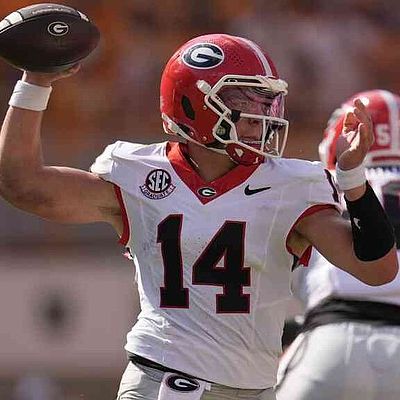 ‘Dawgs fight back for an OT victory | Northwest Arkansas Democrat-Gazette