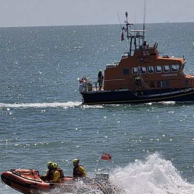 RNLI respond after dinghy with 157 migrants onboard catches fire in Channel