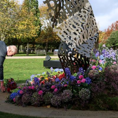 Charles lays flowers at first national LGBT armed forces memorial