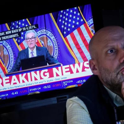 Fed holds rates steady, stays on track for September cut