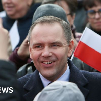 Polish presidential candidate ridiculed for donning disguise to promote book