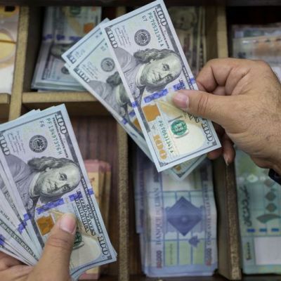 Dollar follows yields higher on strong US data