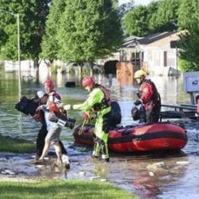 Midwestern flooding collapses a bridge, forces evacuations and kills at least one