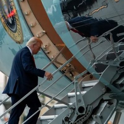 Trump boards Air Force One via small stairs amid heightened security in Florida