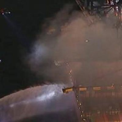 Dozens of firefighters battle blaze on container ship docked at LA port