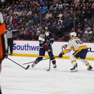 MacKinnon has goal and assist as Avalanche beat Predators 4-2 for 11th straight home win