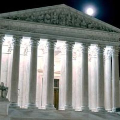 Supreme Court hears arguments over Trump’s bid to limit birthright citizenship as he attends
