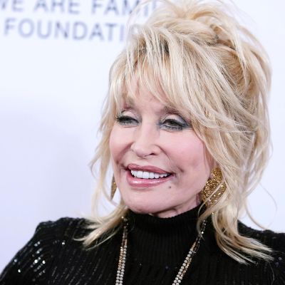 Dolly Parton to be buried in high heels next to her husband, report says