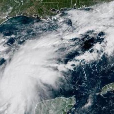 Residents board up windows and National Guard troops deploy as hurricane Isaias nears US Gulf Coast