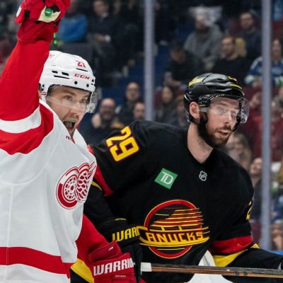 Red Wings skate into first place with 4-0 win in Vancouver