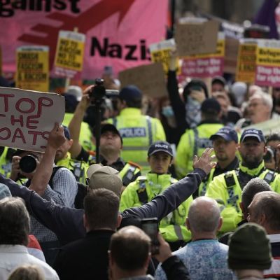 Protests in Manchester turn to trouble in MINUTES as man is arrested