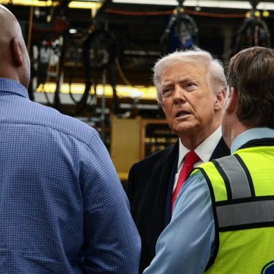 Trump flips off heckler, mouths obscenity at Ford plant in Michigan