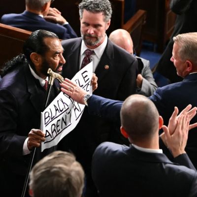Signs, silence, and skipping: How Democrats protested Trump’s State of the Union