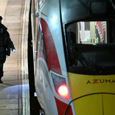 UK police probe mass train stabbing that wounded 10