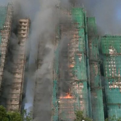 3 arrested over Hong Kong fire that killed dozens, with hundreds still missing