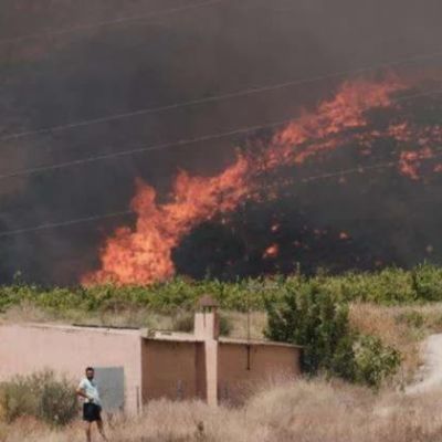 Wildfire kills at least 12 in southern Spain, dozens missing as Europe faces extreme heat