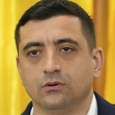 Far-right Trump fan wins 1st round of Romania's presidential election