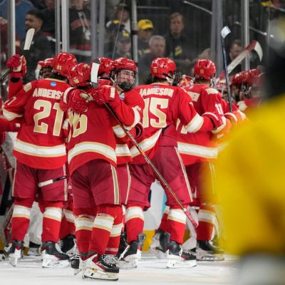 Kent Anderson’s 2-OT winner lifts Denver past Michigan 4-3 in Frozen Four thriller