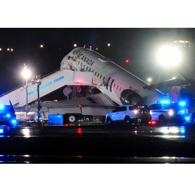 Two pilots killed, 41 injured as Air Canada flight hits fire rescue vehicle at LaGuardia Airport