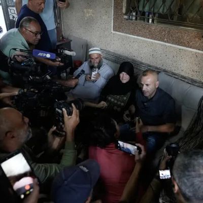 Palestinians defend their homes against against settlers in the occupied West Bank