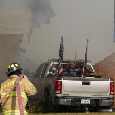 Police remain on scene at burned out Michigan church after shooting and fire leave 4 dead, 8 wounded