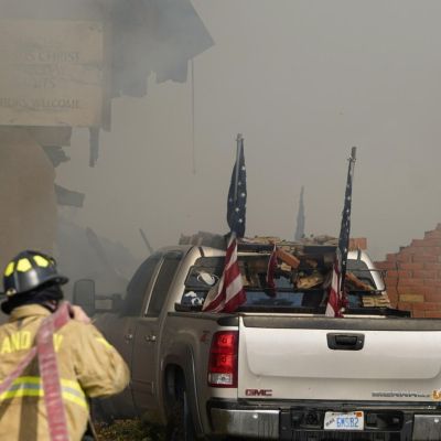 Police remain on scene at burned out Michigan church after shooting and fire