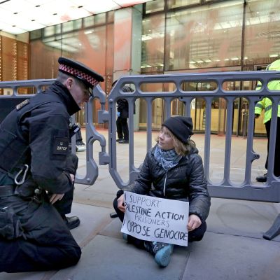 Greta Thunberg arrested under UK terrorism law after displaying placard during pro-Palestine protest