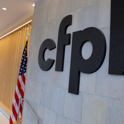 US watchdog caps bank overdraft fees over industry objection