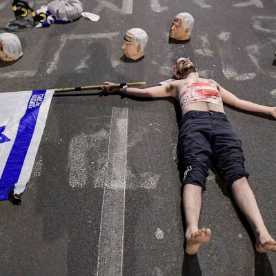 PM shares call for Shin Bet to arrest dozens over faux ‘severed heads’ protest display
