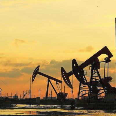 Oil inches up after biggest annual loss since 2020