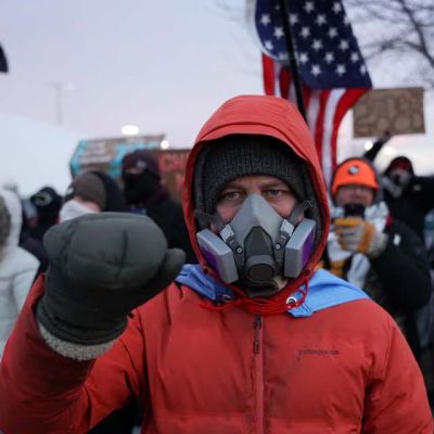 Anti-ICE demonstrators chase off outnumbered far-right activists at Minneapolis rally