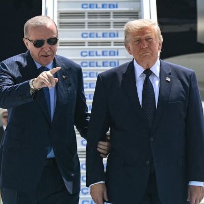 Wandering Trump, 80, Guided by Frail Despot, 72, in Weird Arrival Ceremony