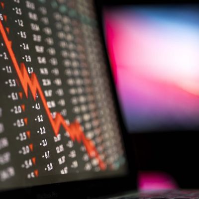 Sensex, Nifty slip as Fed pauses rate cuts; M&M, Asian Paints drag markets