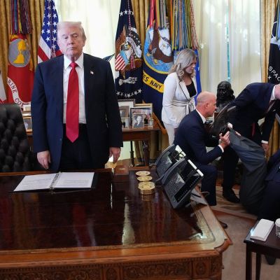 Official passes out in Oval Office while standing behind Trump during event