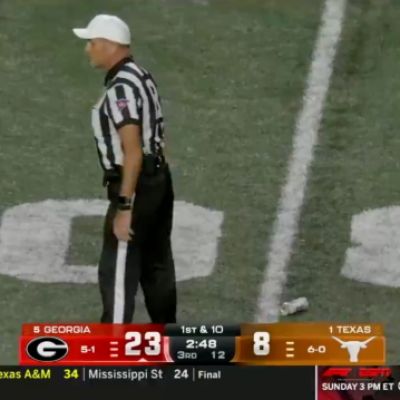 Texas fans seemingly bullied refs into reversing a pivotal pass interference call by throwing bottles