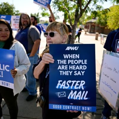 U.S. Postal Service workers rally in Denver to send message they are ready for mail-in ballots in the 2024 presidential election
