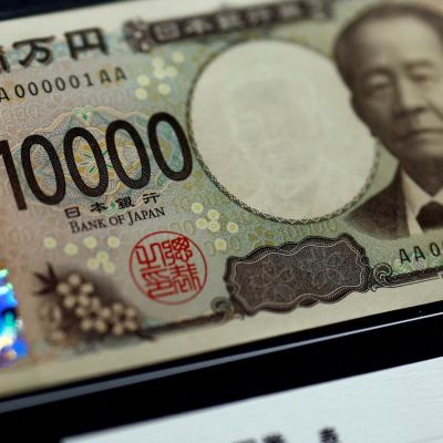 Dollar on the defensive after soft data, little relief for yen