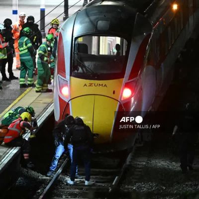 UK police investigate mass train stabbing that wounded 10 people