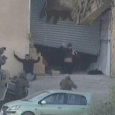 Video shows Israeli soldiers execute 2 Palestinians as they surrender in West Bank raid, rights group says