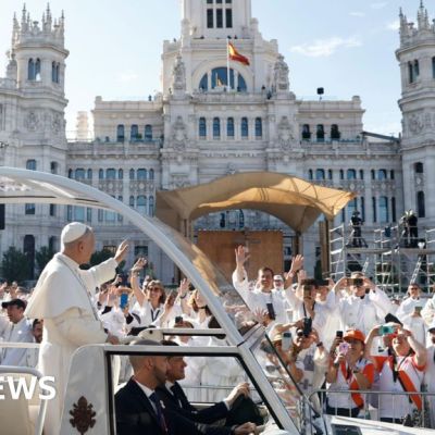 Huge crowds throng Madrid streets as Pope holds open-air mass