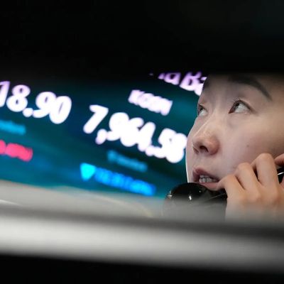 Asian shares fall after a tech sell-off on Wall Street, while oil prices stabilize