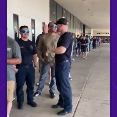 Houston firefighters line up to receive backpay checks from $650 million settlement