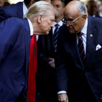 Trump pardons Rudy Giuliani, ex-aides involved in bid to overturn 2020 poll results