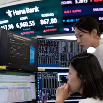Asian shares mostly fall, US futures little changed after US inflation data improves
