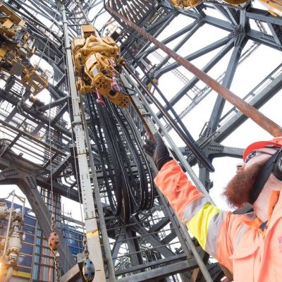 BP cuts debt despite $1bn of impairment charges
