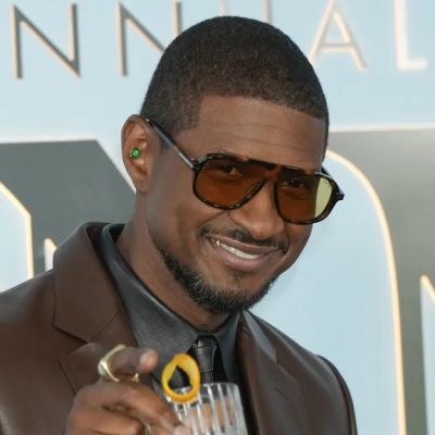 Usher kicks fan off stage after ‘awkward’ dance moment