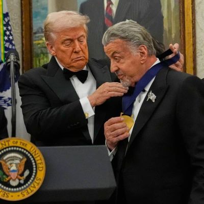 Trump awards medals to the Kennedy Center honorees in an Oval Office ceremony