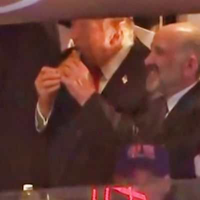 Social Media Is Freaking Out Over the Way Donald Trump Was Caught Eating His Pizza at The NBA Finals [VIDEO]