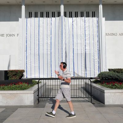 A tarp now covers where Trump’s name used to hang at the Kennedy Center