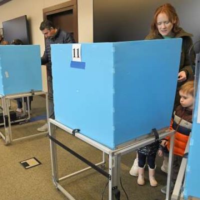 Guide to voting in the suburbs Tuesday: Polling places, ID rules, write-ins and more